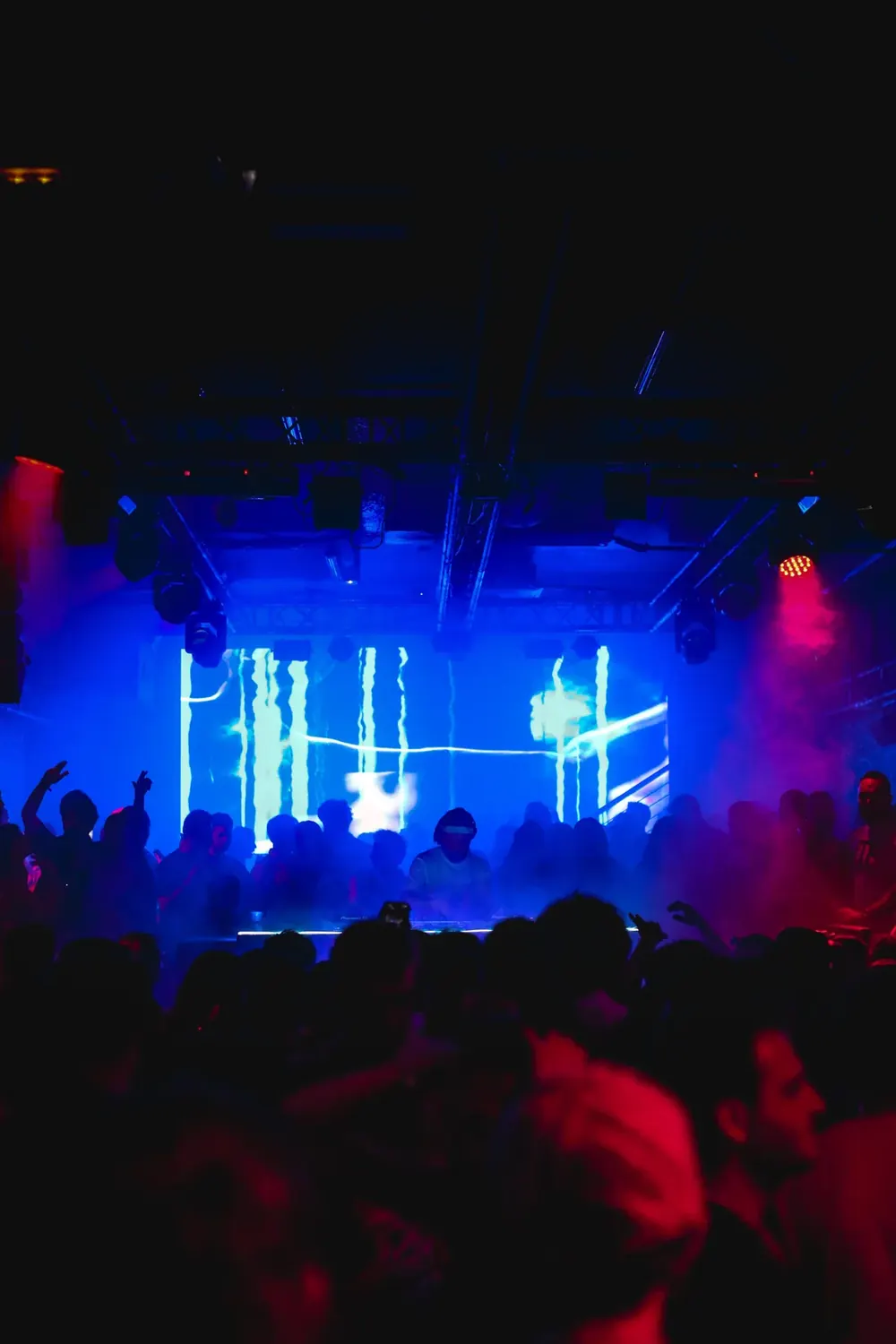 Crowd at La Nuit under red light